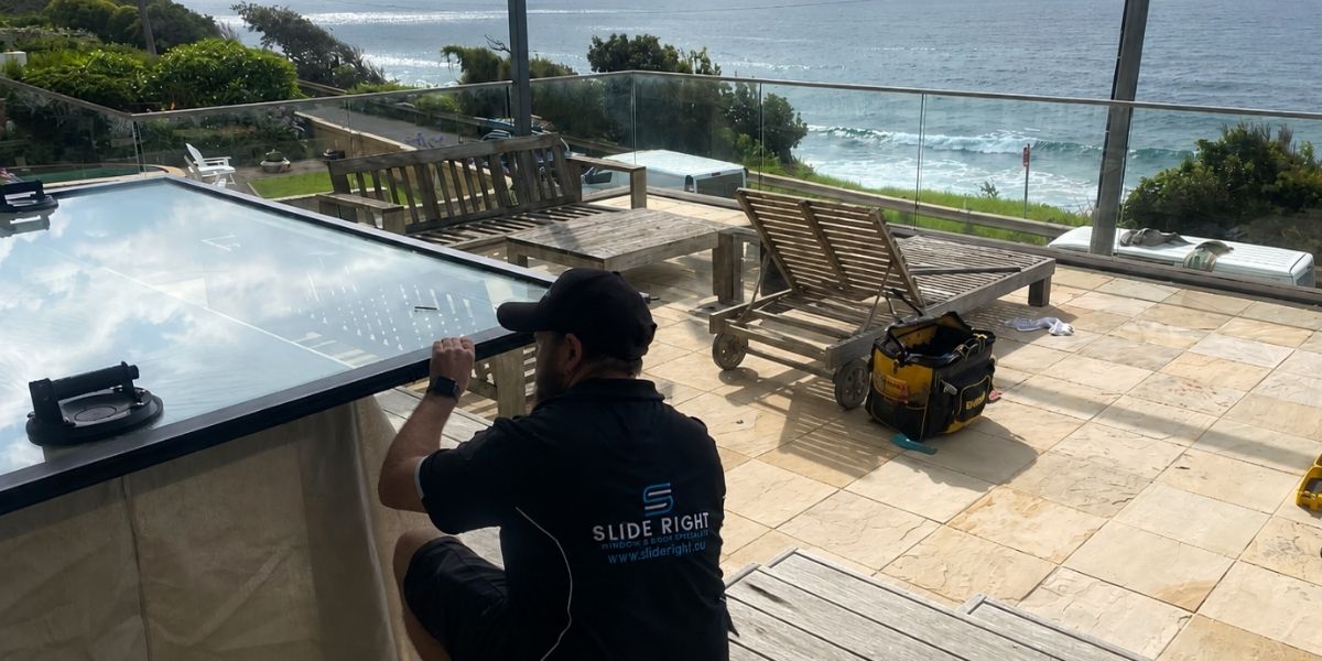 Technician replacing a sliding door roller